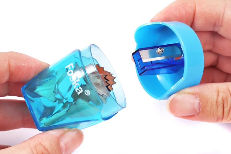 Sharpener with both a lid and a storage container